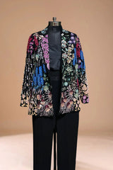 Black blazer with vibrant floral embroidery on a mannequin, luxury Indian ethnic wear