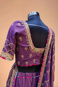 Purple designer saree blouse with gold embroidery and sequin detailing, back view