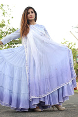 Ghera-e-Naz: Elegant traditional dress with intricate embroidery and vibrant colors displayed on a mannequin.