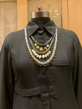 Aavartan handcrafted textile necklace front view on a dark mannequin | Utsavi by Shilpa