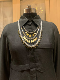 Aavartan handcrafted textile necklace front view on a dark mannequin | Utsavi by Shilpa