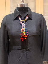 Granthi handcrafted textile necklace displayed on a dark mannequin | Utsavi by Shilpa