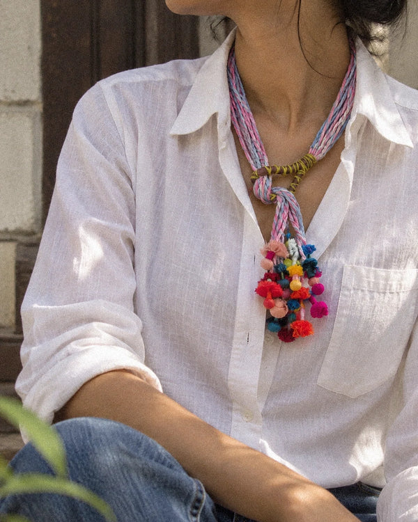 Granthi handcrafted textile necklace worn over a white shirt | Utsavi by Shilpa
