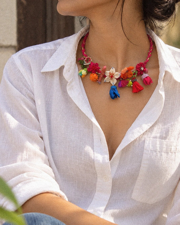 Manjari handcrafted textile necklace worn over a white shirt | Utsavi by Shilpa