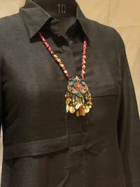 Mayur handcrafted textile necklace front view on a dark mannequin | Utsavi by Shilpa