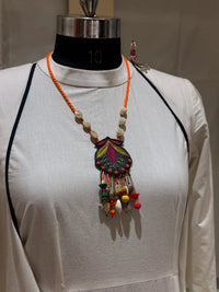 Nisha handcrafted textile necklace front view on a light mannequin | Utsavi by Shilpa