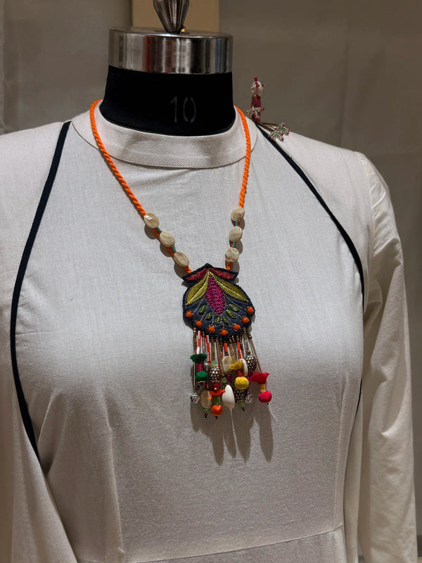 Nisha handcrafted textile necklace front view on a light mannequin | Utsavi by Shilpa
