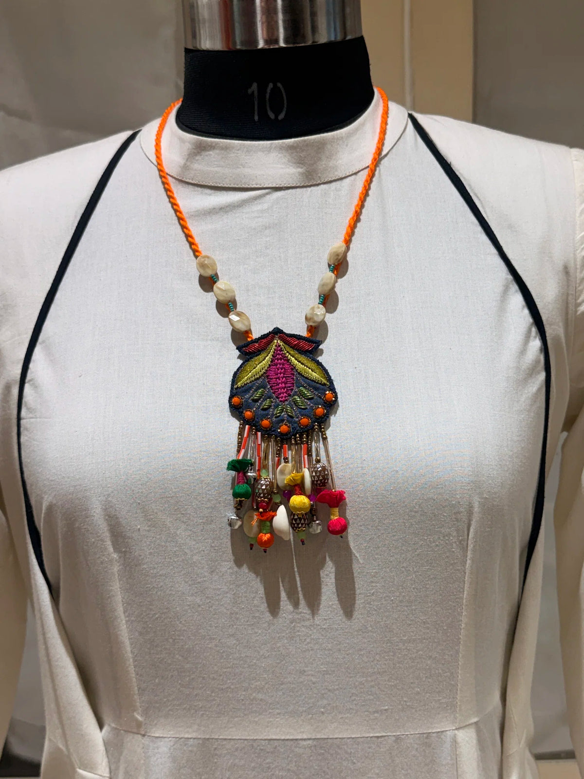 Nisha handcrafted textile necklace alternate view on a light mannequin | Utsavi by Shilpa