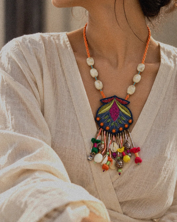 Nisha handcrafted textile necklace worn with a light sari | Utsavi by Shilpa