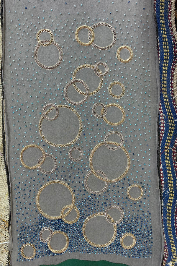 Grey pashmina shawl with gold embroidered circles and blue beaded detailing