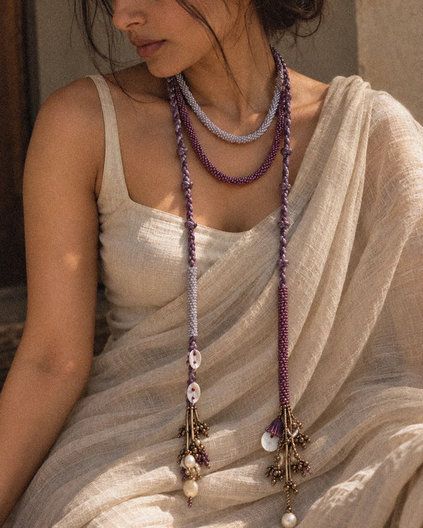 Sangati handcrafted textile necklace worn with a light sari | Utsavi by Shilpa