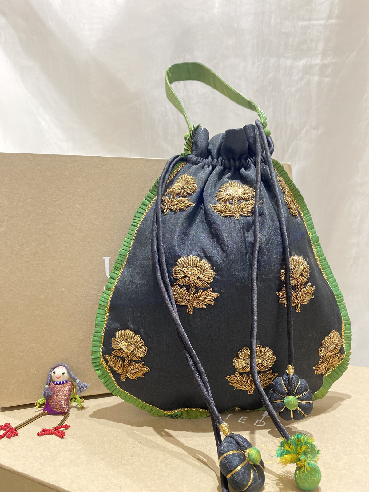 Siyah Noor handcrafted embroidered potli bag, product photograph 1