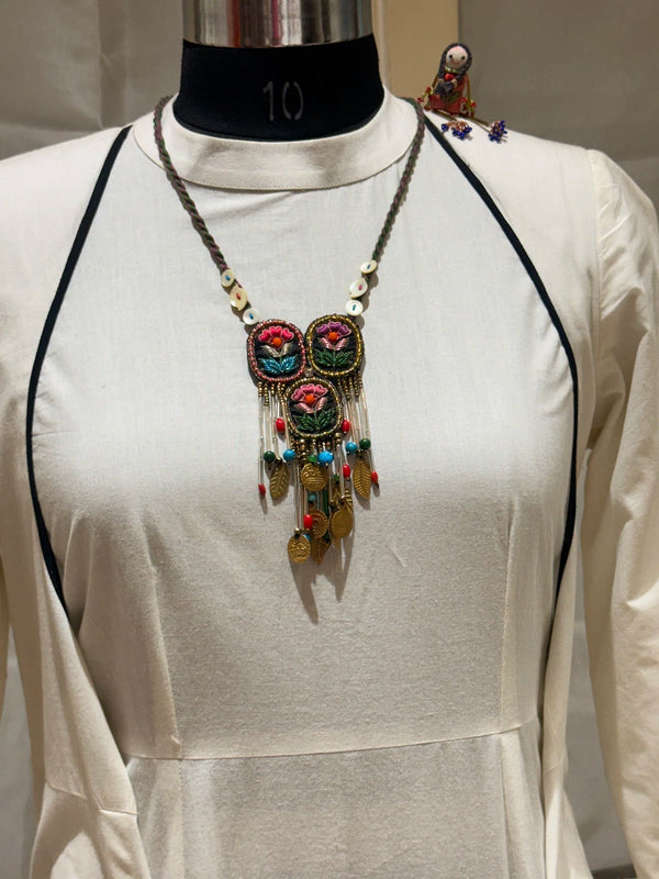 Triveni handcrafted textile necklace alternate front view over a light garment | Utsavi by Shilpa
